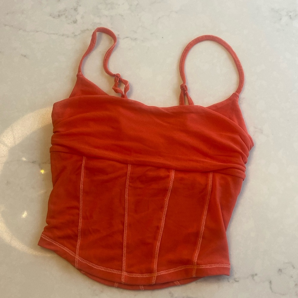 Urban Outfitters orange mesh tank, size small.